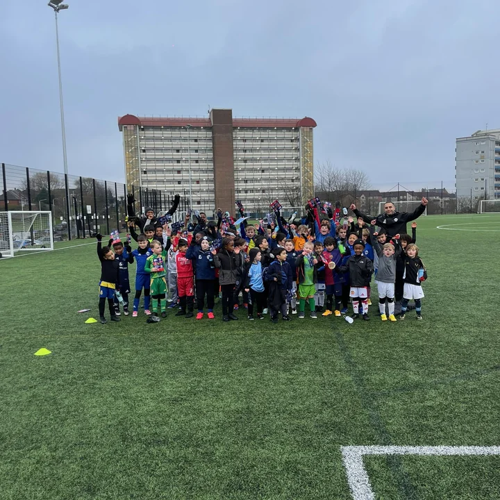 Matico players cheering on the 3G astro pitch